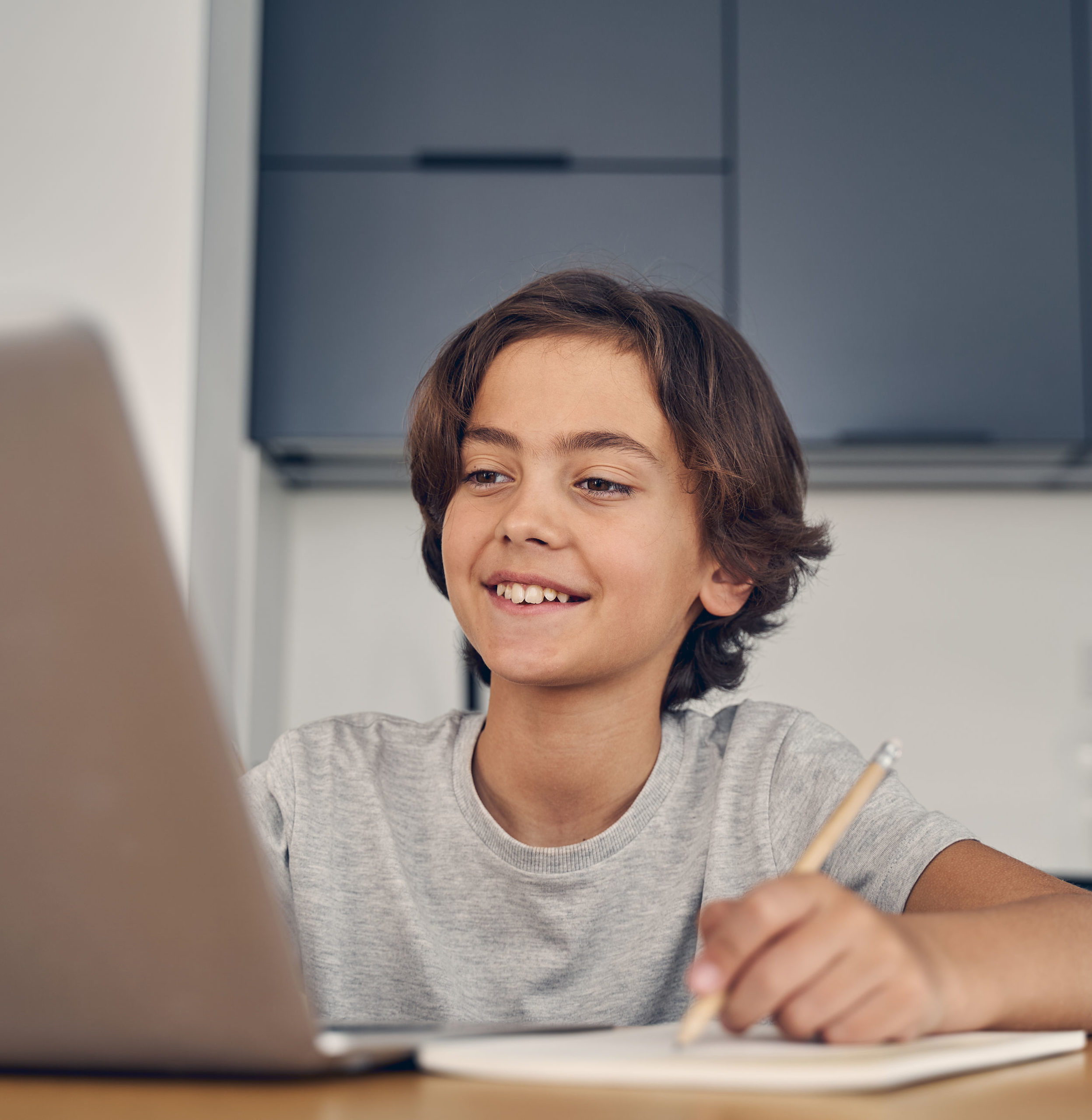 Cute Caucasian child staying alone at home